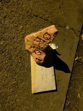 Painted Rock and envelope containing letters from LeighAnn Davies-Arroyo and Elyria, Ohio Town Mayor Frank Whitfield