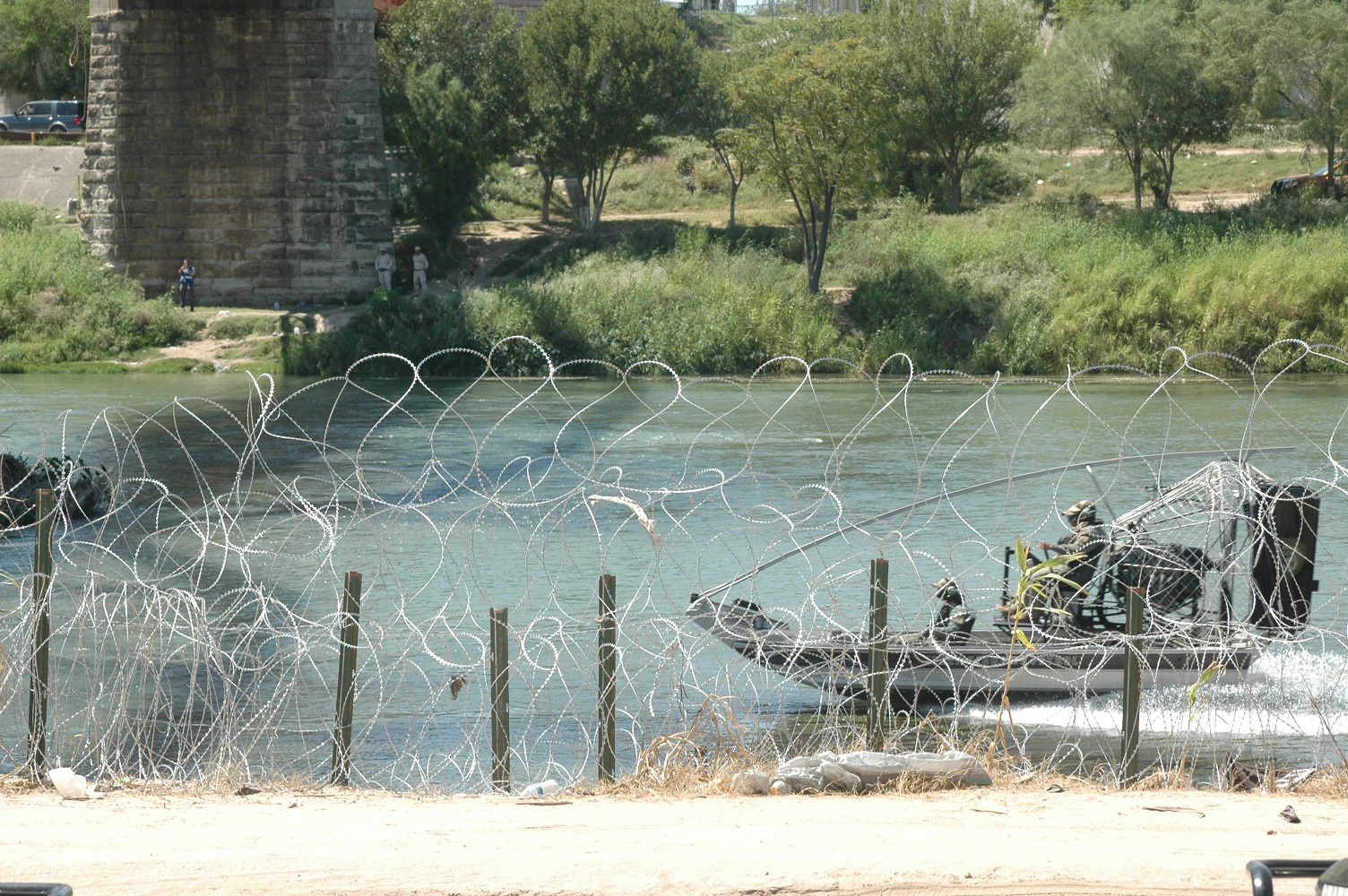 A boat could be seen patrolling the river